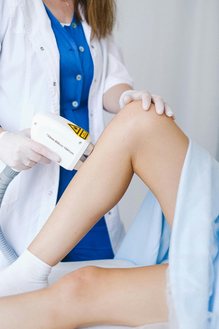 Woman's leg receiving laser hair removal